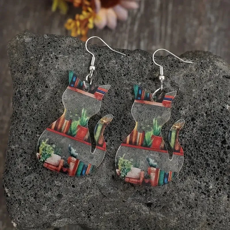 Acrylic Cat Shaped Earrings With Books And Plants